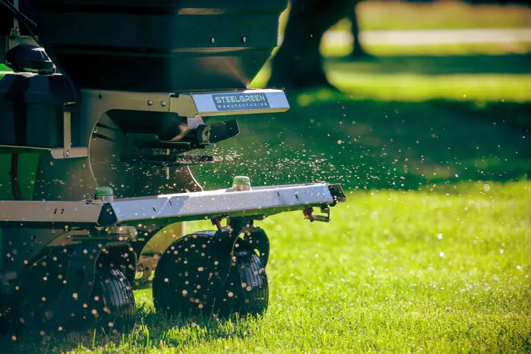 Spreading Lime Application On Lawn.